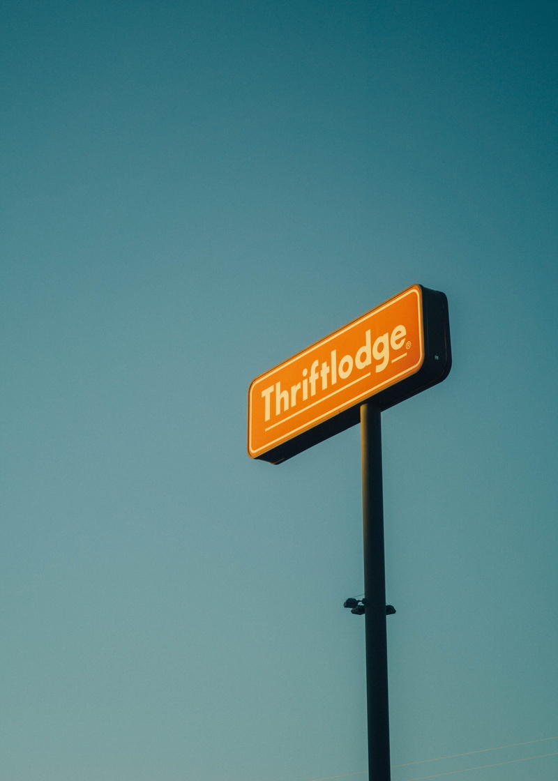 sky, saskatoon, copy space, text, western script, road, warm, 5K, communication, directional sign, motel, low angle view, direction, arrow symbol, blue
