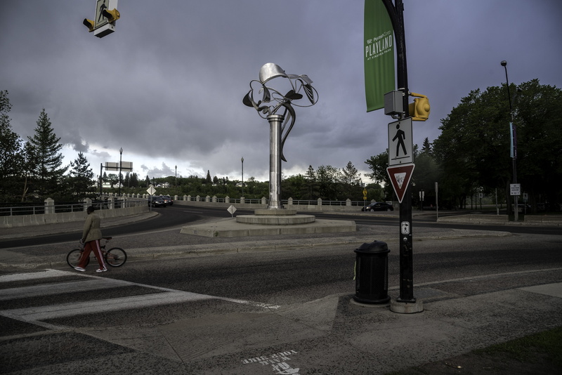 urban Scene, no people, city, built structure, city center, architecture, tree, public domain, road, street, sign, nature, street Light, sky, outdoors