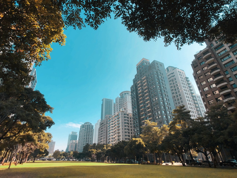 transportation, taichung, skyscraper, park, office building, urban, incidental people, building exterior, sky, downtown, plant, architecture, metropolis