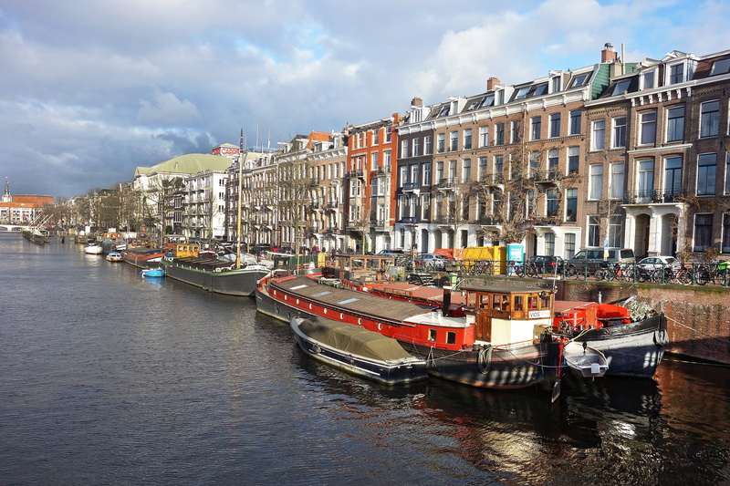 near, outdoors, waterfront, no people, venice of the north, moored, netherlands, canal, nautical vessel, establishments, passenger craft, built structure