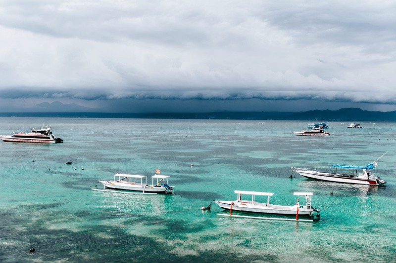 anchored, cloud - sky, transportation, sailboat, tranquility, horizon over water, turquoise colored, lembongan island, land, outdoors, idyllic, sea, tranquil scene