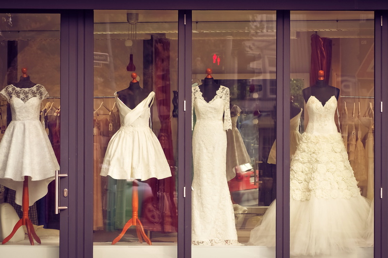 no people, human representation, elegant, design, wedding dress, window, clothing, mannequins, retail, fashion, bridal, retail display, four, reflection