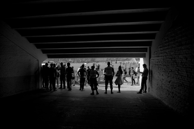 indoors, adult, input, lifestyles, real people, unemployed, sports display, stairs, full length, walking, crowd, city, silhouette, competition, game, male