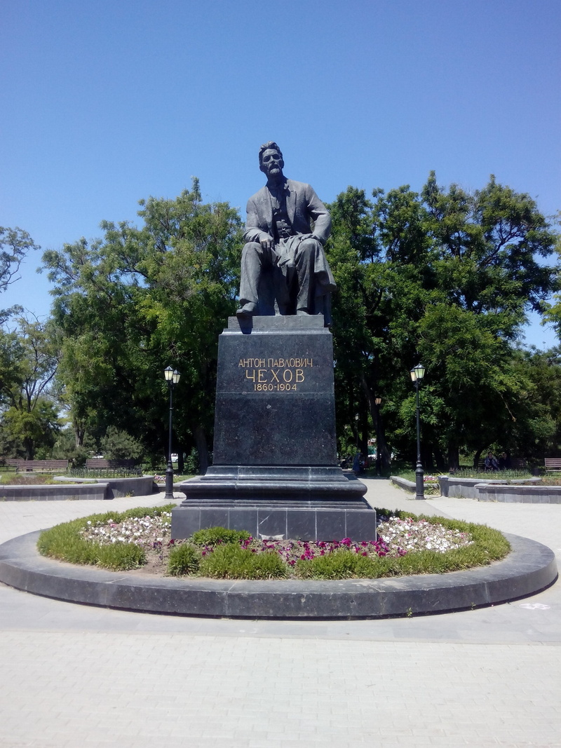 history, text, sculpture, representation, chekhov, tree, monument, male likeness, journey, sky, travel destinations, birthplace, statue, outdoors, the past