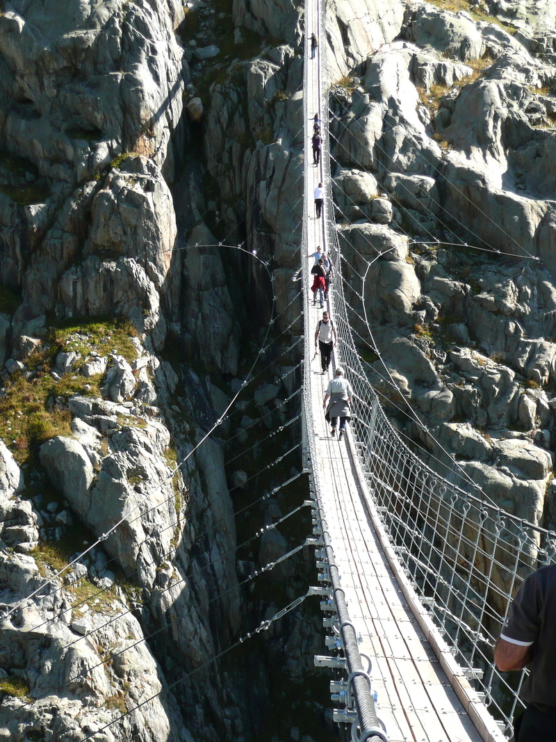 trift bridge, cooperation, teamwork, day, lifestyles, bridge, rock - object, gadmen, group of people, transportation, high angle view, real people, group