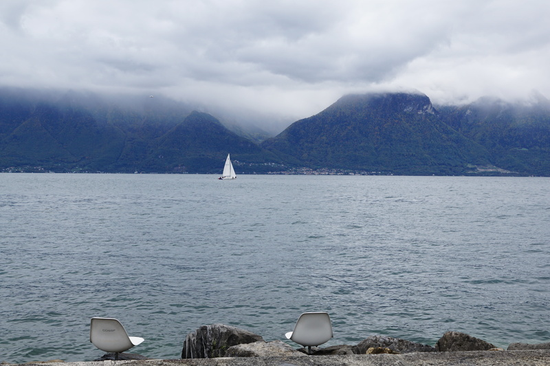 no people, lake geneva, outdoors, travel, sky, sailing, mountains, tranquility, tourism, beauty in nature, fog, nautical vessel, sail, mountain range, sailboat