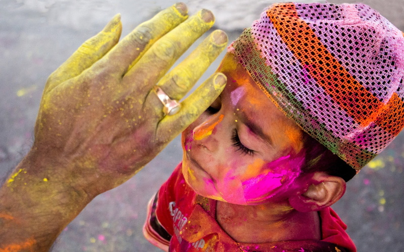 outdoors, Holi, children, focus on foreground, one person, colored, paint, portrait, human body part, human face, close-up, 1080P, clothing, leisure activity