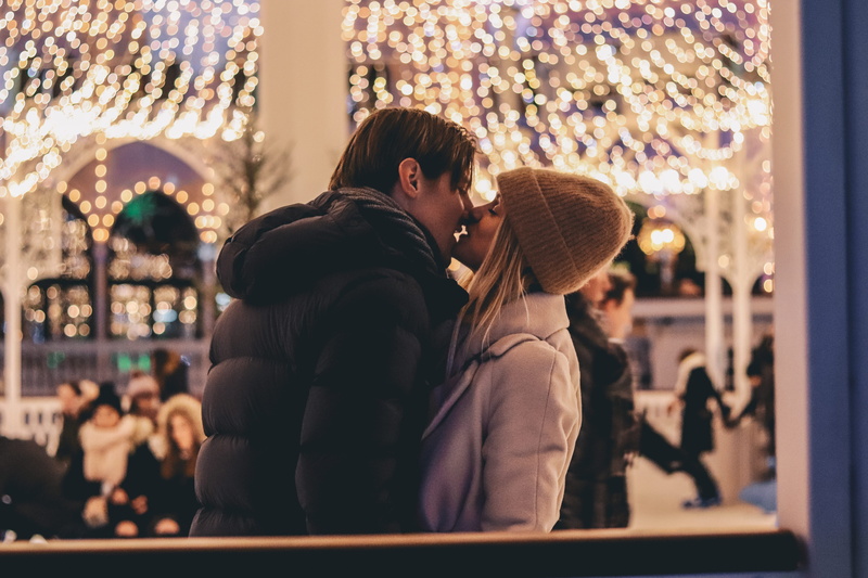 young men, emotion, warm clothing, love, people, winter, couple, skate, women, togetherness, real people, lighting equipment, ice skating, rink, illuminated