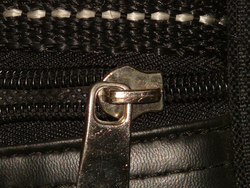 indoors, open, bag, textured, pattern, gold colored, closure, protection, belt, make to, security, personal accessory, lock, zipp, close-up, metal, no people