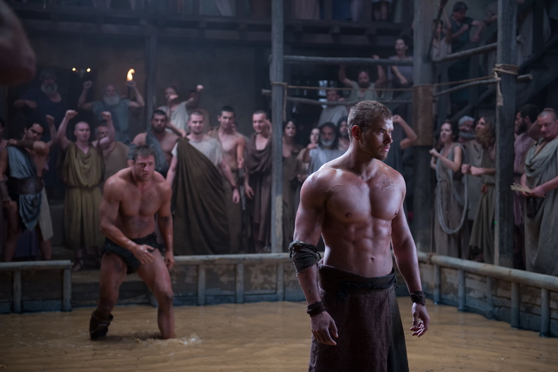 standing, athlete, three quarter length, men, muscular build, lifestyles, fighter, large group of people, focus on foreground, shirtless, indoors, architecture