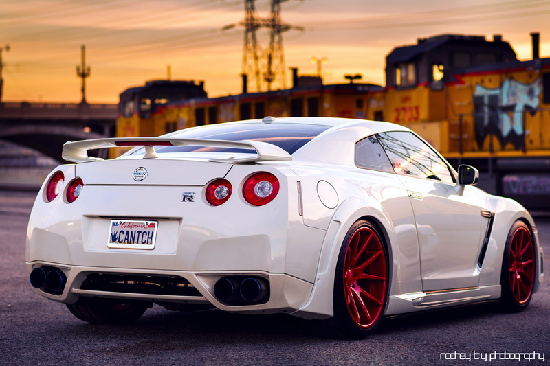 the sky, modern, front View, ass, motor Vehicle, street, outdoors, white, reflection, engine, Nissan, r, mode of transportation, speed, status Car, elegance
