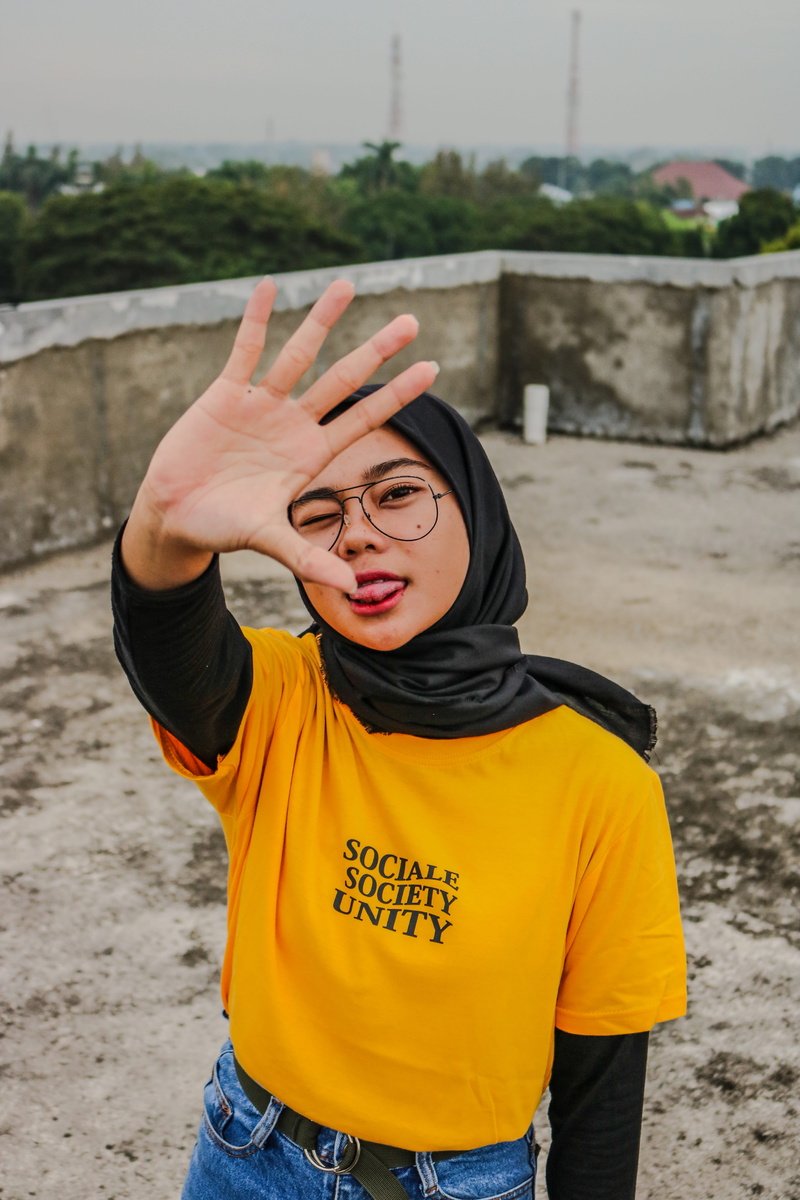 outdoors, glasses, one person, human arm, nature, ground, waist up, adventure, arms raised, clothing, street, lifestyles, leisure activity, razing, real people
