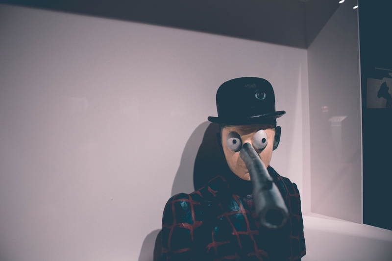 hat, futuristic, cap, museum, wall - building feature, indoors, copy space, real people, one person, portrait, rene magritte, headwear, sitting, 5K, reflection