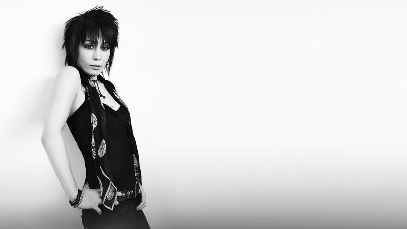 contemplation, fashion, copy space, beautiful woman, bangs, beauty, joan jett, portrait, indoors, one person, young women, standing, looking at camera
