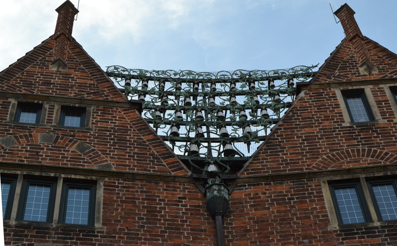 hooper street, places of interest, window, low angle view, wall, roof, architecture, brick wall, glockenspiel, house, day, sky, old houses, old building