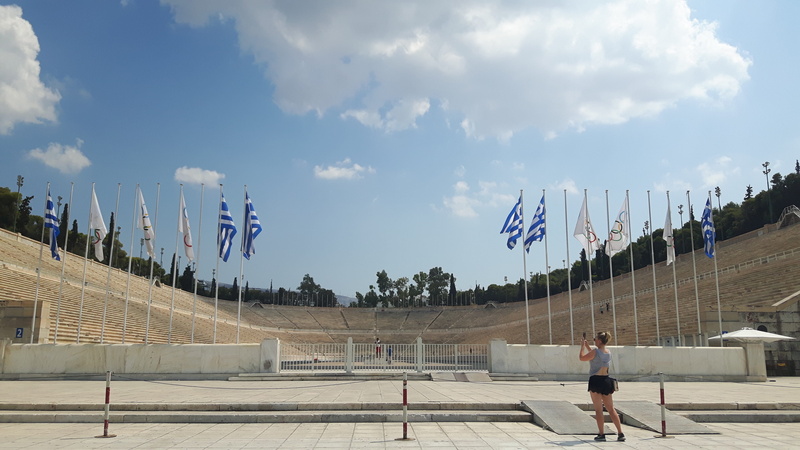 day, cloud - sky, olympiad, leisure activity, antiquity, stadium, men, places of interest, adult, lifestyles, women, architecture, sky, full length, greek
