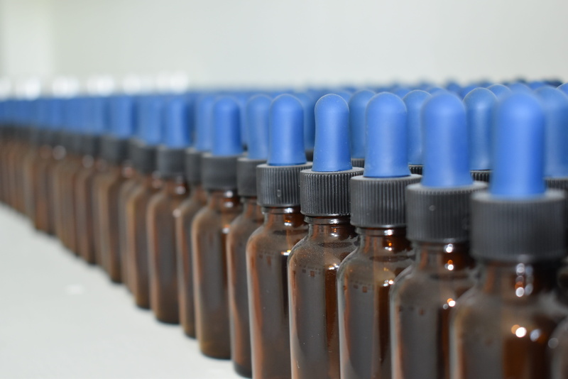 dropper, medicine alternative, team, glass - material, selective focus, metal, color, group of objects, no people, indoors, homeopathy, business, choice