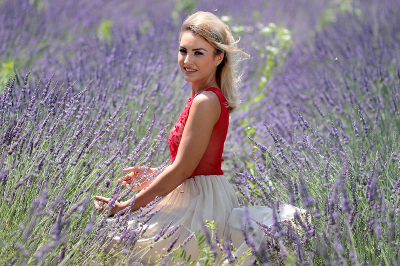 flowering plant, hairstyle, aromatherapy, dress, outdoors, beauty, therapy, hair, flower, plant, lavender, one person, nature, blonde, beauty in nature