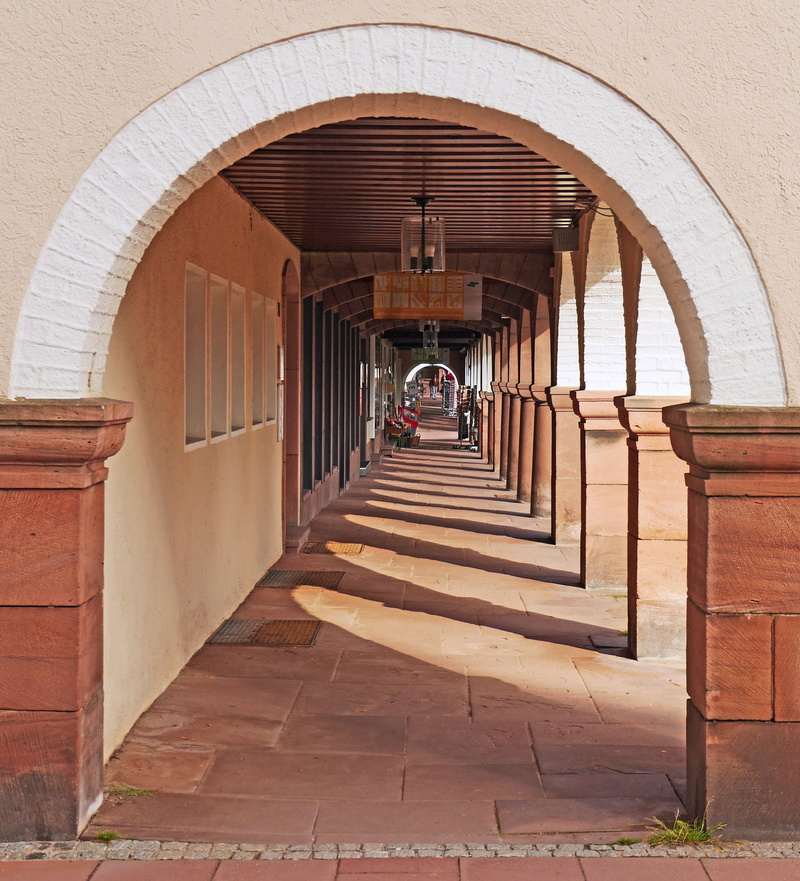 architectural column, wood - material, in a row, building, sunlight, built structure, freudenstadt, the past, colonnade, corridor, building exterior, historic market square