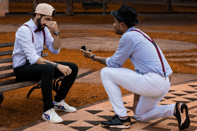 daylight, sitting, romance, man, two people, young adult, seat, bench, fun, proposing, day, togetherness, hat, recreation, couple, friendship, men, urban