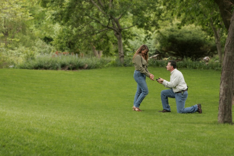 family, males, parent, field, leisure activity, lawn, females, full length, son, green, green color, engagement, tree, daughter, outdoors, two people, plant