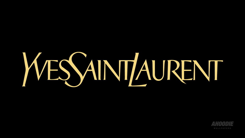 western script, dark, sign, Yves saint laurent, night, single word, studio shot, communication, black color, text, indoors, message, black background, no people