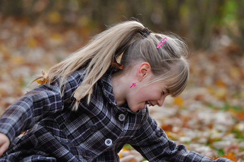focus on foreground, children only, girl, women, laughing, laugh, one girl only, change, 4K, shallow focus, plant part, headshot, looking, autumn, daytime