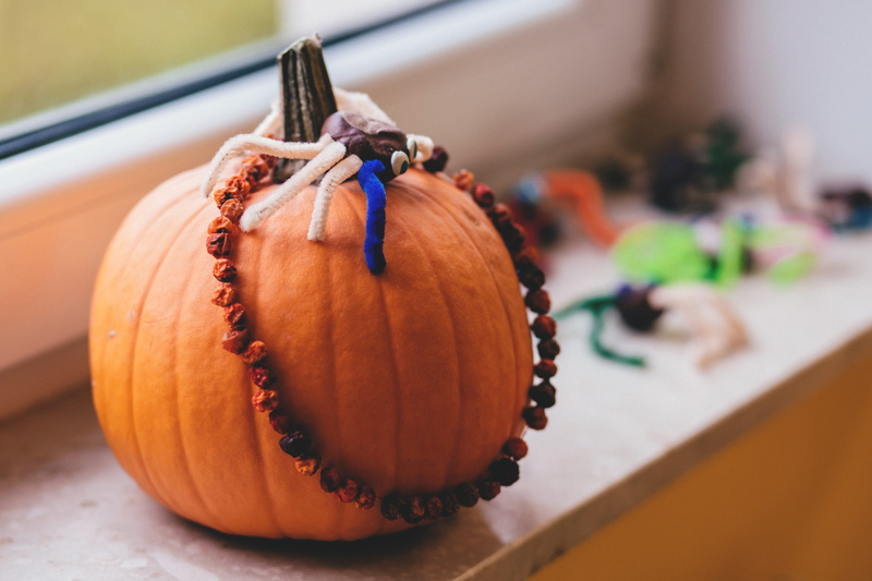 autumn, celebration, focus on foreground, halloween, pumpkin, baby, food and drink, carving, candy, art and craft, no people, colorful, wood - material