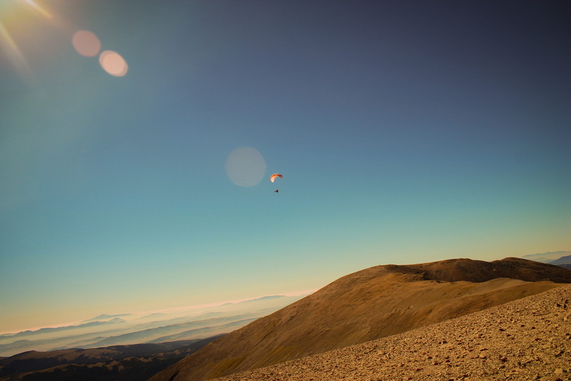 alma, sport, tranquility, colorado, paragliding, scenics - nature, extreme sports, mountain, environment, arid climate, sky, 4K, mid-air, adventure, light leak