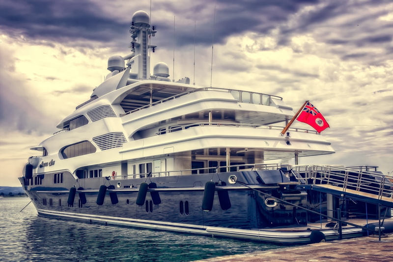 boat, sea, luxurious, wealth, shipping, incidental people, patriotism, clouds, water, harbor, port, holiday, day, pier, built structure, transportation