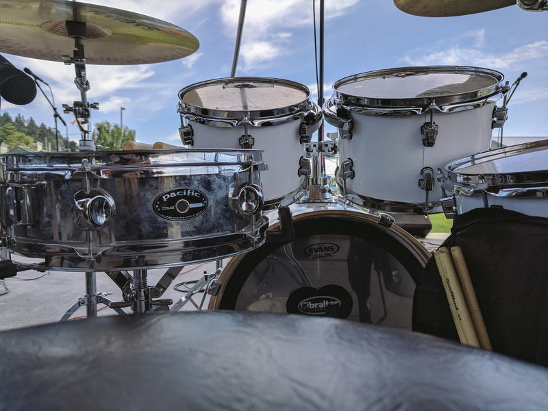 day, machinery, outdoors, transportation, technology, gear, cloud - sky, selective focus, musical equipment, metal, musical instrument, equipment, no people