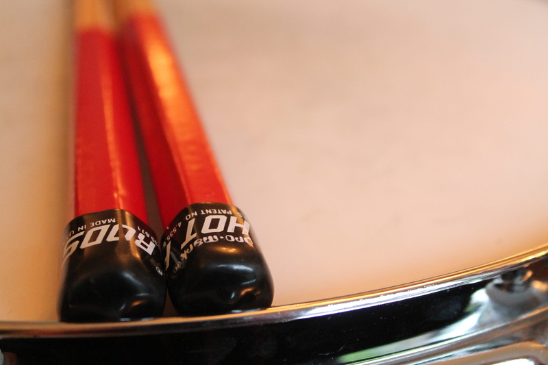 drummer, sticks, shoe, rods, copy space, sport, selective focus, colored background, hit, studio shot, competition, black color, drum head, ealing, united kingdom