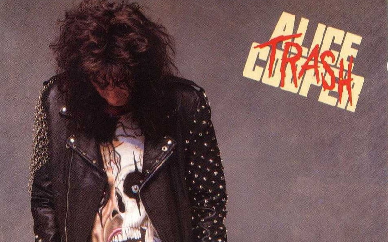western script, obscured face, hairstyle, capital letter, front view, waist up, mammal, 1080P, adult, alice cooper, text, unrecognizable person, hair
