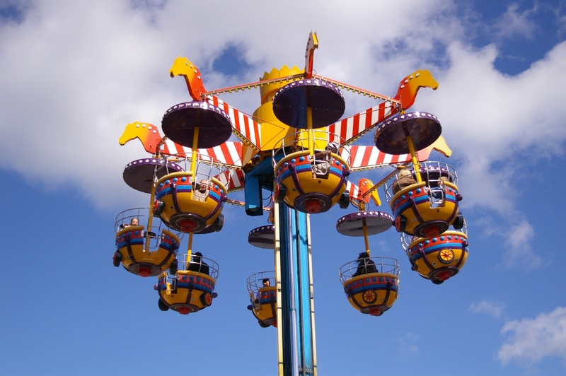 amusement, sunlight, fairground, leisure activity, park, sky, fun fair, arts culture and entertainment, motion, fun, nature, fair, enjoyment, group of people