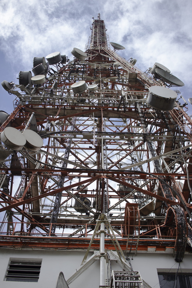 building exterior, antenna, travel destinations, perspective, chain swing ride, low angle view, satellite dish, outdoors, no people, telecommunication
