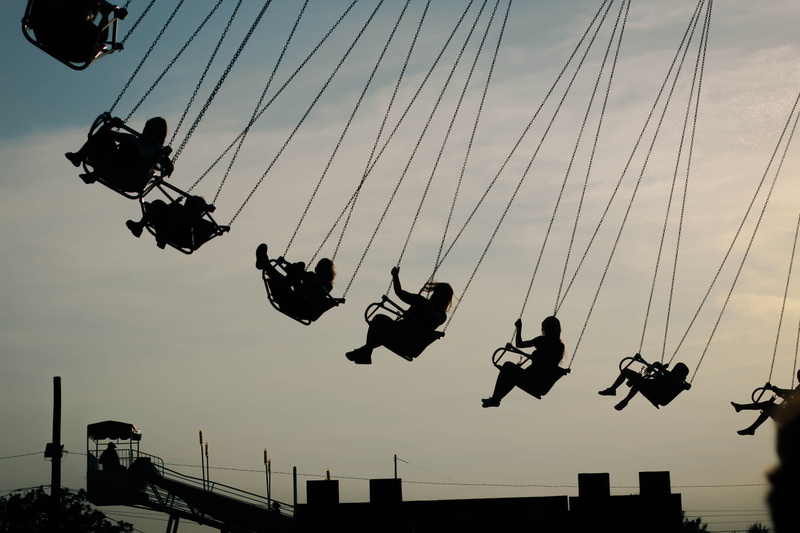 real people, carnival, cloud - sky, helicopter, transportation, group, amusement park, human, carnival ride, nature, playground, lifestyles, outdoors, silhouette