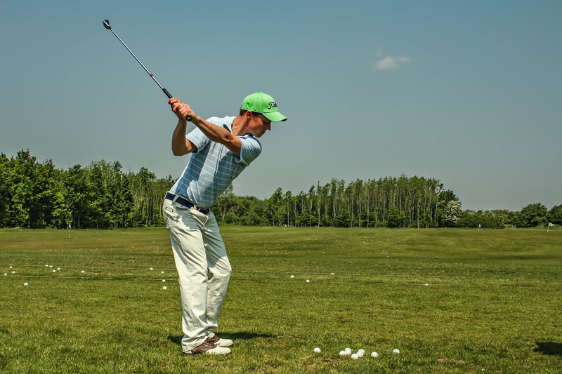 nature, golfer, exercise, full length, one person, golf Club, taking a shot - sport, green color, motion, golf swing, green - golf course, golf, recreational Pursuit