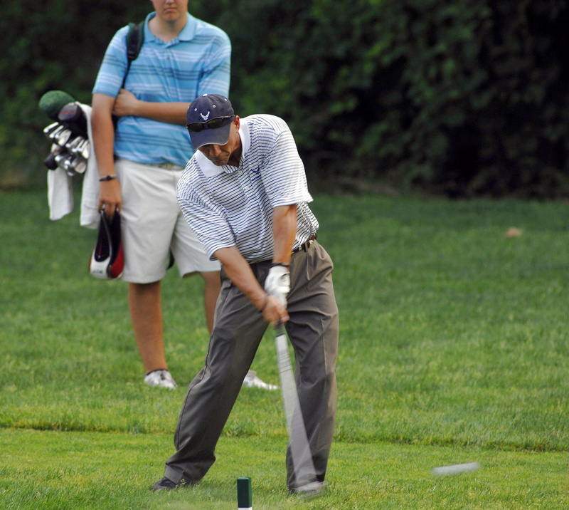 grass, holding, bonding, flag, men, ball, competition, tournament, leisure activity, golfer, lifestyles, two people, golf, hole, recreation, plant, game