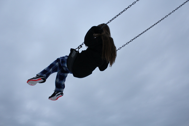 cloud - sky, shirt, childhood, motion, sleeved, child, black, chain, full length, lifestyles, mid-air, women, day, swings, sky, casual clothing, nature