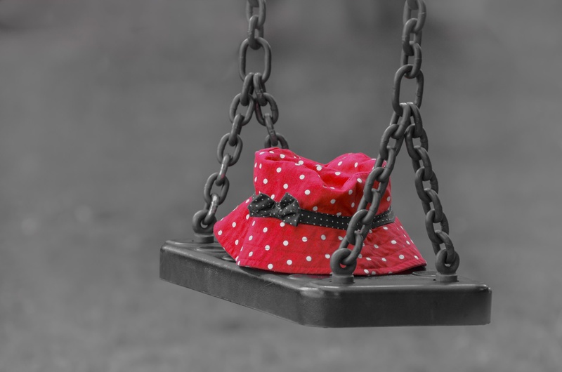 hanging, seasons, emotion, focus on foreground, polka, outdoors, close-up, playground, child, ribbon, holiday, chain, forgotten, polka dots, swing, day