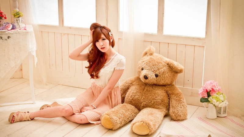 leisure activity, furniture, window, toy, young women, hairstyle, indoors, home interior, teddy bear, real people, stuffed toy, Asian, childhood, one person