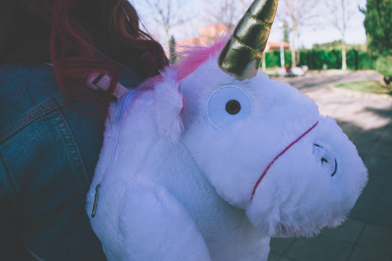 day, close-up, one person, unicorn, representation, ca, childhood, clothing, domestic animals, winter, fantasy, lifestyles, mammal, bag, women, stuffed toy
