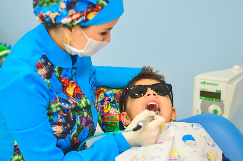boy, wearingblack, women, s, checking, dentist, innocence, real people, day, teeth, portrait, blue, glasses, child, females, leisure activity, childhood