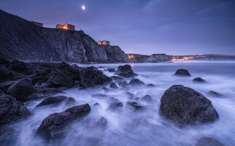 lighting, image, bay, houses, spain, lights, blue, night, moon, 1080P, gallery, stones, beach, biscay, sea - ocean, rocks, sky