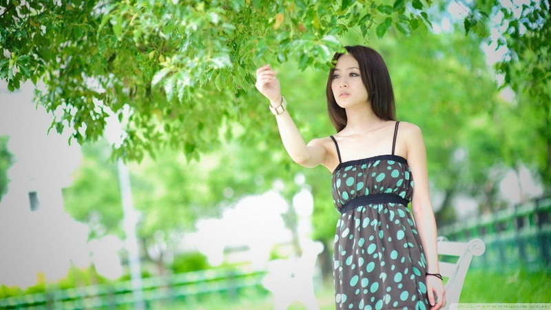 1080P, hairstyle, tree, black dress, outdoors, hair, adult, brown hair, nature, day, focus on foreground, holding, brunette, young women, long hair, plant
