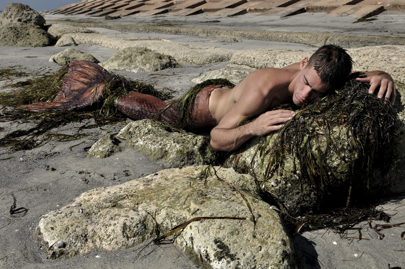 pruning, solid, young adult, lying on back, lying down, one person, real people, rock, brown, shirtless, sand, lying on front, young men, land, rock - object