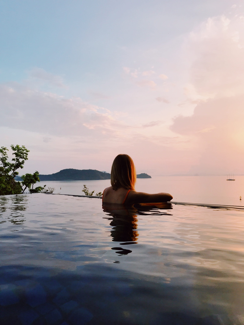 beach, transportation, fashion, waterfront, ocean, tranquil scene, boat, sea, cloud - sky, 4K, sky, swimming pool, outdoors, beauty in nature, hairstyle