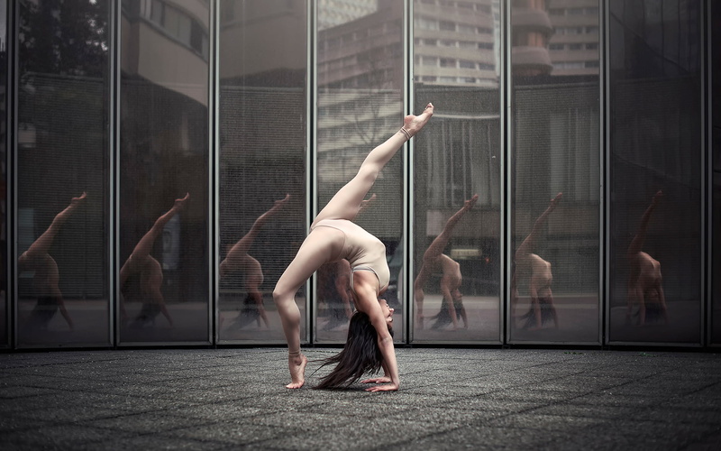 vitality, healthy lifestyle, acrobat, arms raised, agility, reflection, dancing, handstand, balance, s, one person, grace, women, human body part, skill
