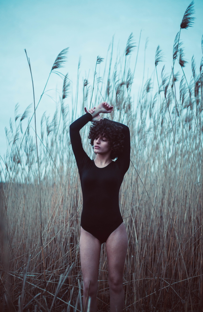 young adult, surrounded, three quarter length, taken, near, young women, leotard, lifestyles, hairstyle, daytime, real people, women, grass, growth, front view