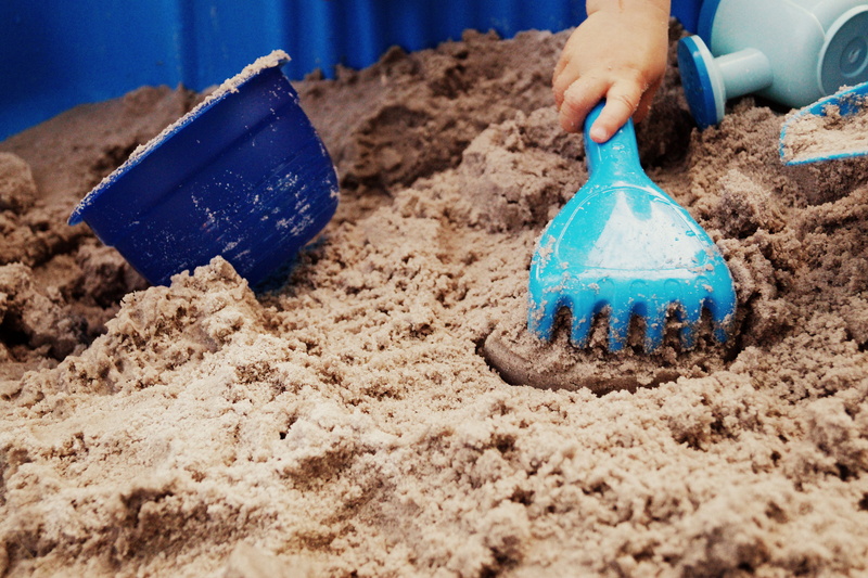 mixing, dirt, occupation, men, outdoors, beside, person, making, plastic, children watering, close-up, child, selective focus, land, 5K, sand, working